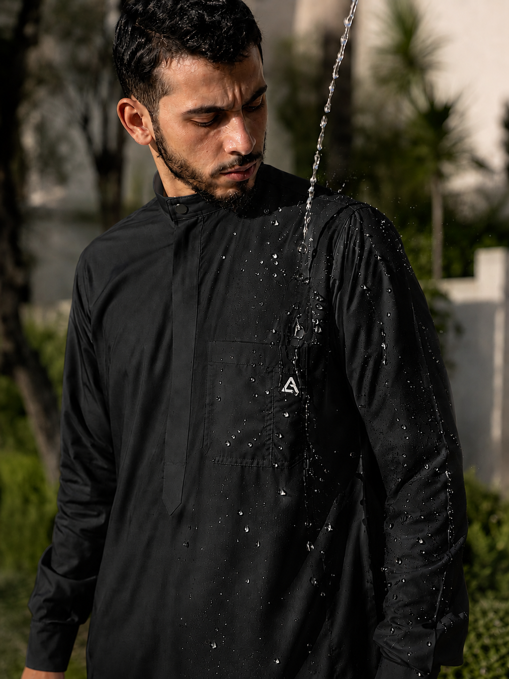 Qamis LANSARI noir - vue de face